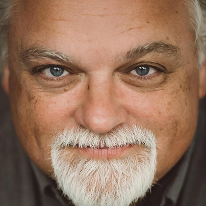 Headshot of Chris Rund - Strategic Communications Partner, Content
 Developer, and Creative Director